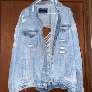 Large worn styled, light washed, denim jacket from Forever 21.